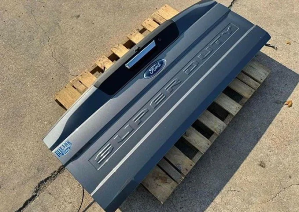 2020-2022 Ford Super Duty OEM Tailgate in Carbonized Grey with Camera and Step for Sale